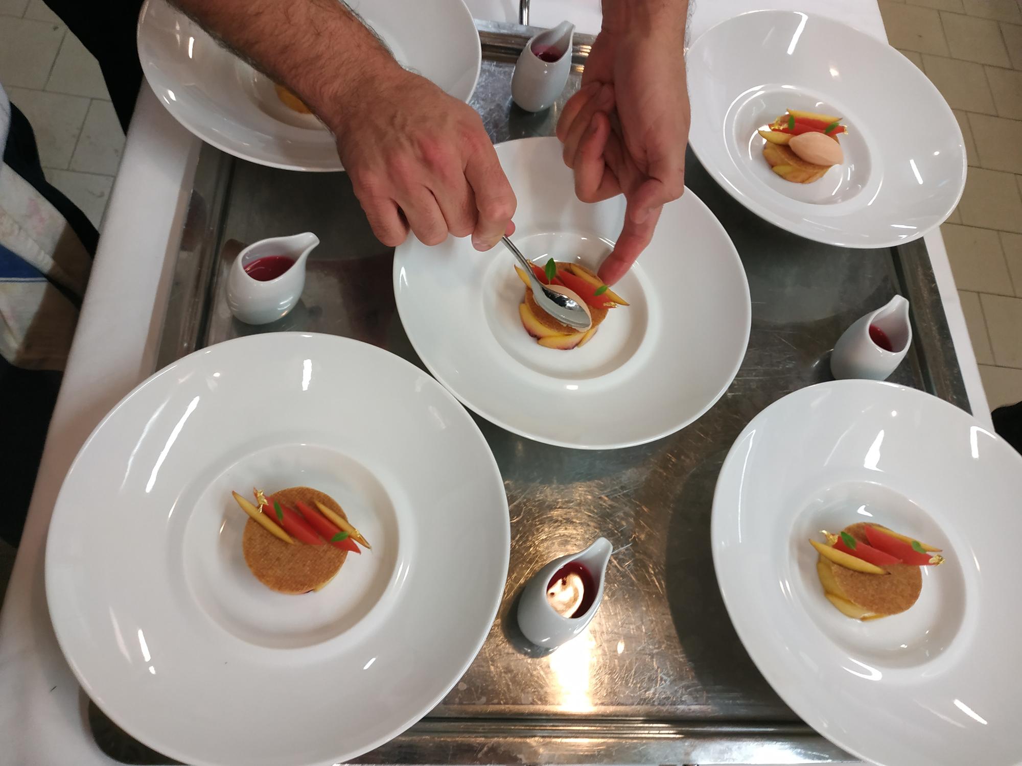 Chef demonstrating plating technique